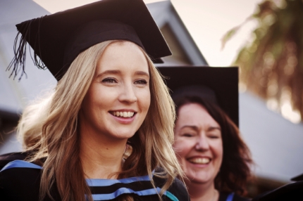 Students graduating happy