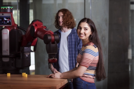 Students on campus machinery