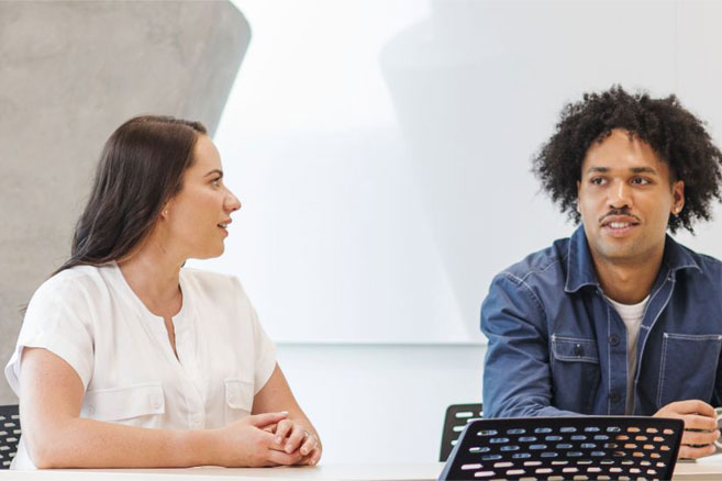 Students on campus sitting lesson