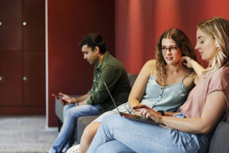 Students on campus studying