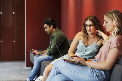 Students on campus studying