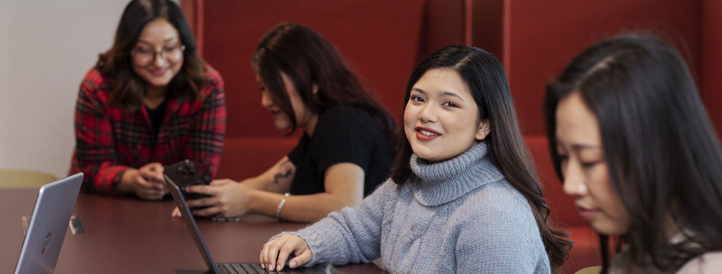 Students on campus working together